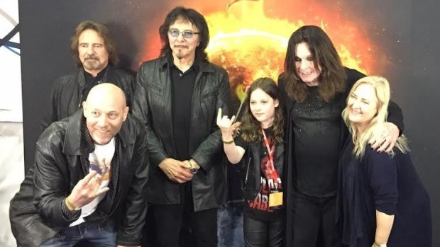 Canberra schoolboy Callum McPhie, 11, with his dad Doug McPhie (front) and mum Melissa Freeman meeting Black Sabbath members (l-r) guitarists Geezer Butler and Tony Iommi and frontman Ozzy Osbourne before their Sydney concert on April 23.