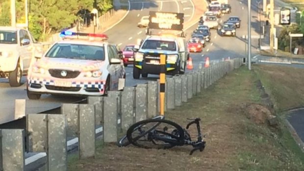 A cyclist has suffered life-threatening injuries after a collision with a car on the run into the CBD.
