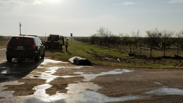 Police at the scene of two-vehicle crash that left several storm chasers dead.