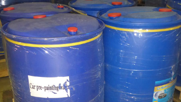 Australian Border Force investigators allegedly found 2000 litres of GBL hidden in 10 drums inside a shipping container after it arrived in Port Botany.