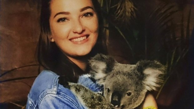Amelia Blake's family released this photograph of Ms Blake holding a koala at Australia Zoo.