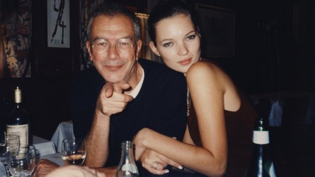 Michael White, the most famous man you've never heard of, with English model Kate Moss.