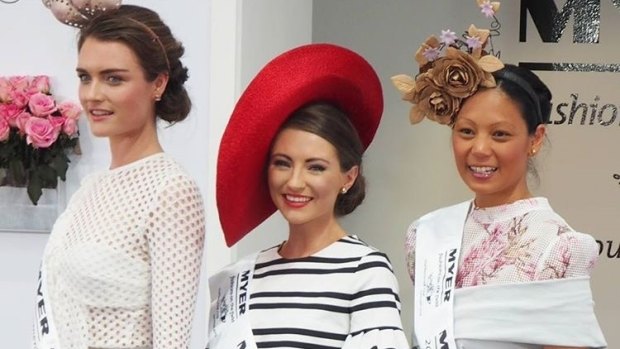 Queensland hat-maker Georgia Gardiner, centre, takes top prize at Oaks Fashions on the Field.