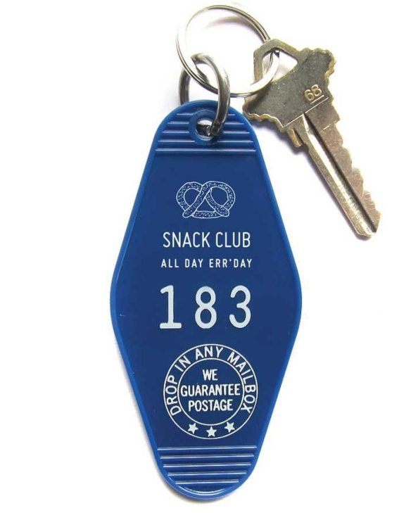 Snack Club key tag, $US5 from Three Potato Four,
<a href="http://threepotatofour.com/collections/hotel-motel-key-tags/products/snack-club-key-tag" target="_blank">threepotatofour.com</a>.