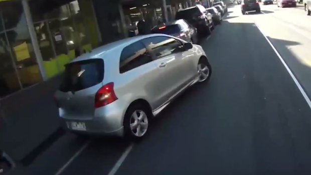The driver is filmed pulling out from a car space on Sydney Road.