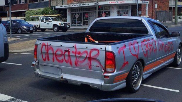 The spraypainted car spotted in Launceston was posted to Facebook page 'Dash Cam Owners Australia' on Monday.