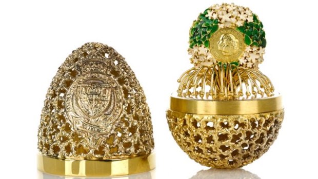 Stuart Devlin, London 1977, 1981, silver gilt commemorative egg
to commemorate the wedding of Prince Charles and Lady Diana Spencer. It opens to reveal a white and green flower wreath with inset commemorative plaque.
