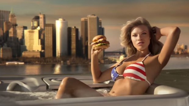 Sports Illustrated model Samantha Hoopes, in a hot tub, advertises the Most American Thickburger.