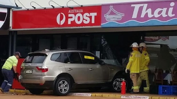 Staff at the post office were behind the counter when the car crashed through the glass frontage.