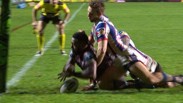 Controversy: Akuila Uate drops the ball over the line, but the try was awarded.