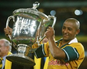 Wallabies legend: George Gregan with the Bledisloe Cup after a 16-14 win over New Zealand in 2002.