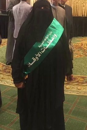 Female preacher Mona Salah wears a sash showing she has been approved by Egypt's Ministry for Religious Endowments.