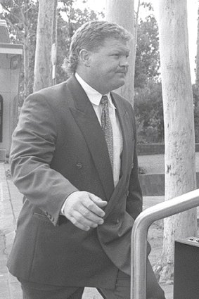 The former Penrith and State of Origin rugby league player Brad Izzard enters the court where he faced a drunk driving charge in 1994.