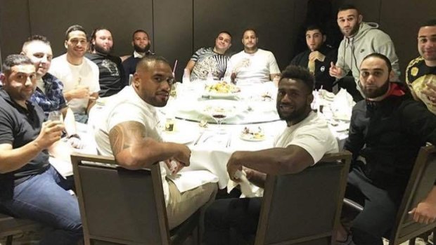 Dinner at The Century: Rafat Alameddine (fifth from left in black shirt) and former bikie Paulie Younan (sixth from left at back of table) pictured with Corey Norman, James Segeyaro and Junior Paulo.
