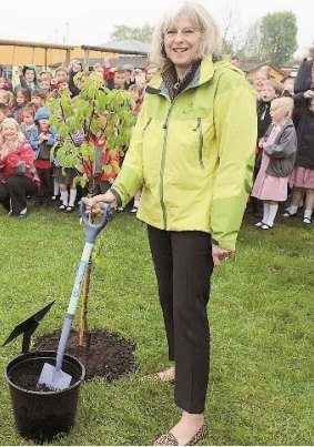 Theresa May at the 50th anniversary of St Edmund Campion Catholic Primary School. Note the shoes.