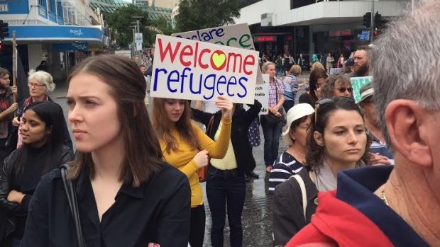 Hundreds told of 'sucessful ' asylum seekers being sent home at rally at refugee rally in King George Square