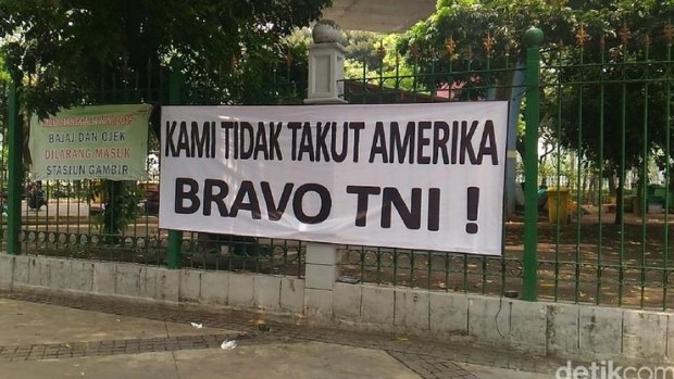 A banner in Jakarta proclaiming 'We are not afraid of America. Bravo National Armed Forces'. It was posted following the US decision to bar General Gatot Nurmantyo from entering the US.
