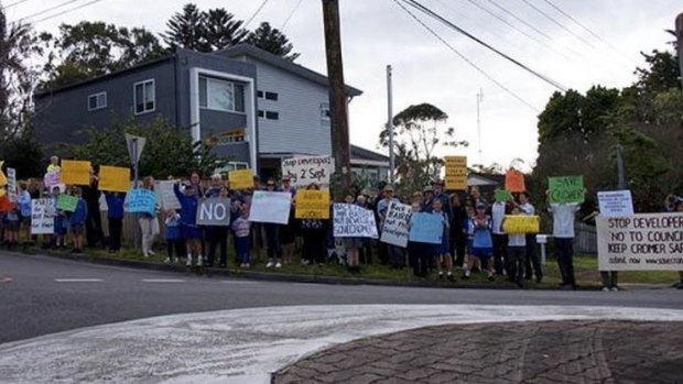 Residents protest against the planned boarding house gather in Cromer.