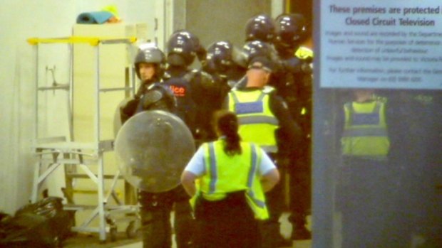 Riot police and dog handlers were called to the Parkville centre last November.