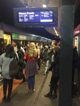 Passengers alight a V/Line train at Sunshine train station after a man was struck, causing delays to the Geelong and Ballarat lines.