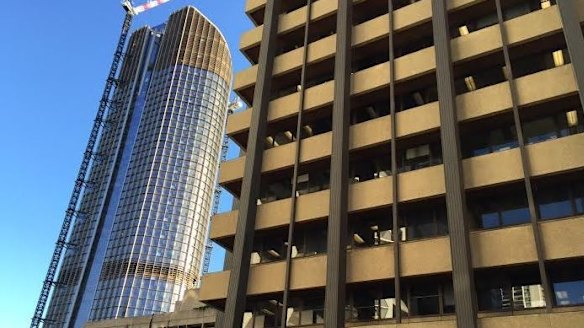 The old and the new of Queensland's public sector - 1 William Street (left) and the soon-to-be demolished Executive Building.