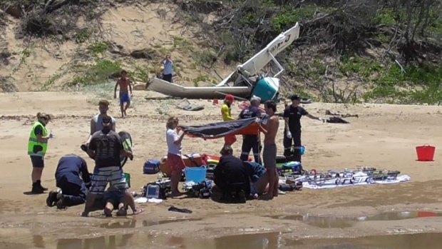 A woman died after the joyflights plane crashed on Middle Island near Agnes Water on Tuesday.
