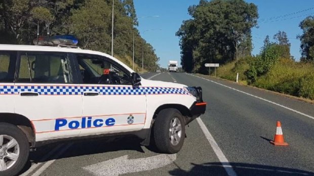 The Mount Lindesay Highway remained closed into the afternoon, following a fatal eight-vehicle crash at Woodhill just after 8am.