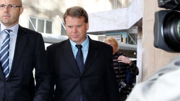Nathan Tinkler's Buildev partner Darren Williams arrives at the ICAC this morning.  