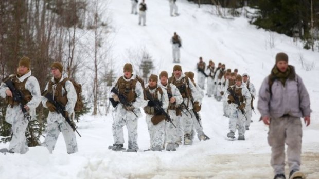 
US Marines assigned somewhere in the vast training area in Rena, Norway,