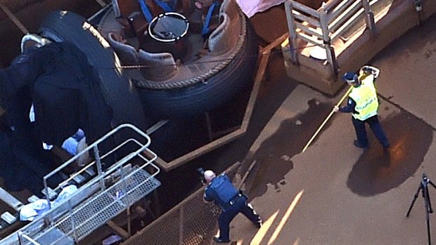 The scene at the Thunder Rapids ride after the accident.