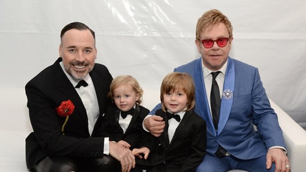 David Furnish, Elijah Furnish-John, Zachary Furnish-John, and Sir Elton John at their Academy Awards viewing party on February 22. 