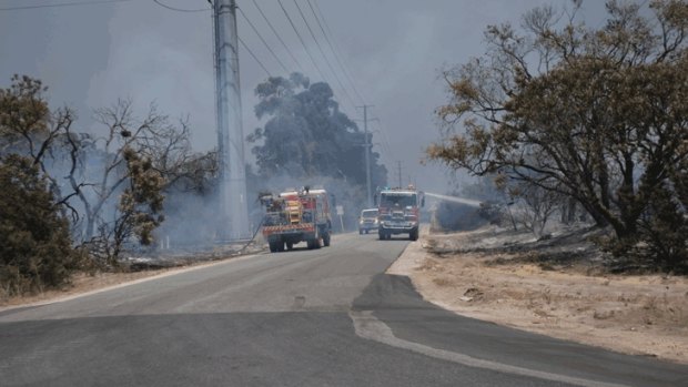 Firefighters battle a large bushfire in Bullsbrook.