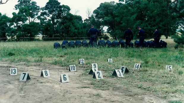 Police search the Police Paddocks Reserve in Dandenong where the body of murdered taxi driver Emanuel Sapountzakis was found on March 2, 1993. 