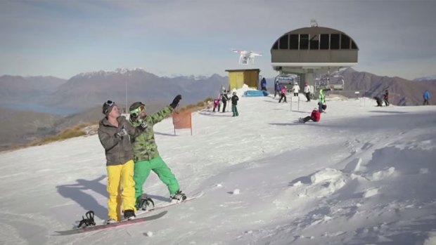 Snowboarders take a 'dronie' at Coronet Peak in New Zealand.