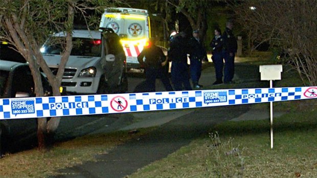 Police outside the property at Lalor Park.