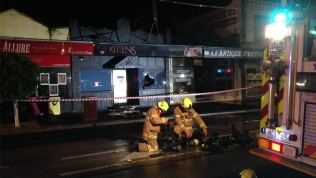 Firefighters outside Kittens strip club on Glen Huntly Road in Caulfield South.