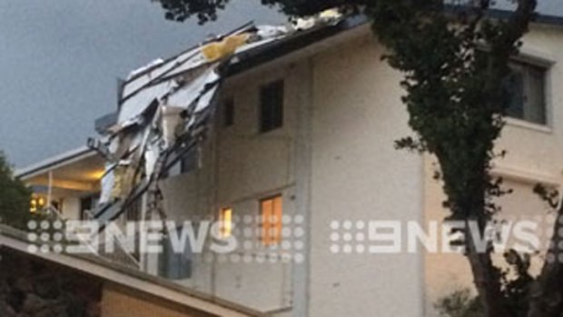 A Cottesloe apartment building comes off second best after Thursday morning's storm.