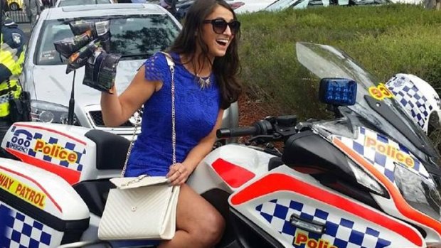 Sarah Finn on a police motorbike.