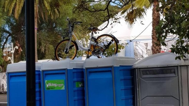 An oBike was left on top of portable toilets in Prahran.