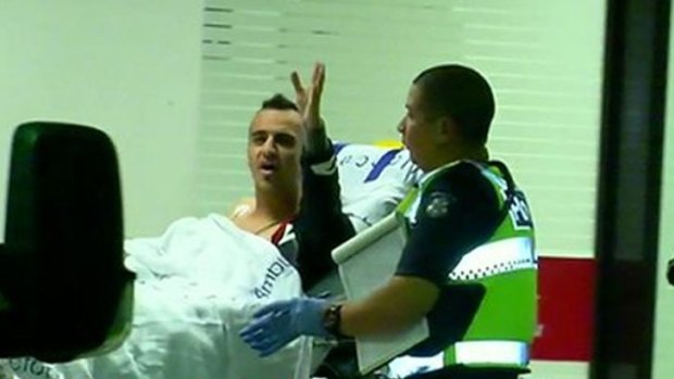 Ahmed al Hamza being wheeled into the Royal Melbourne Hospital after being shot.