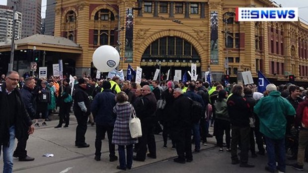 Protesters outside Flinders Street station on Wednesday afternoon.