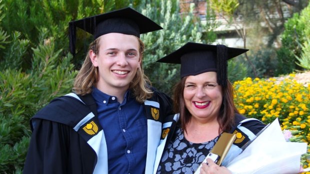 Maxwell and Sharon at their graduation ceremony.