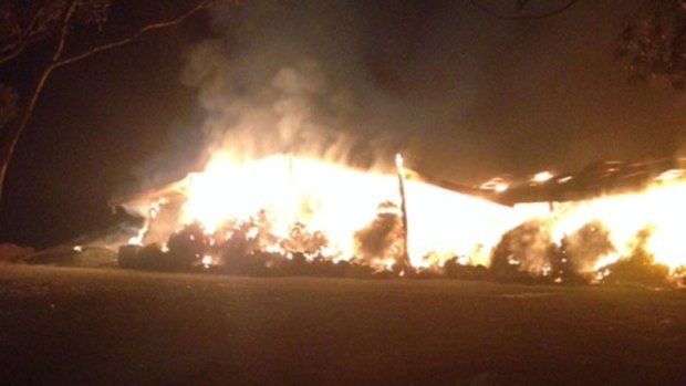 Fire engulfed the hay shed about 8pm on Sunday.