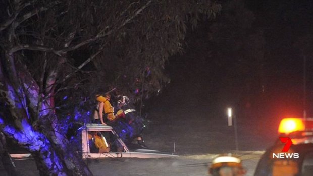 Man and girl stranded in floodwaters at Inverleigh on Wednesday night.