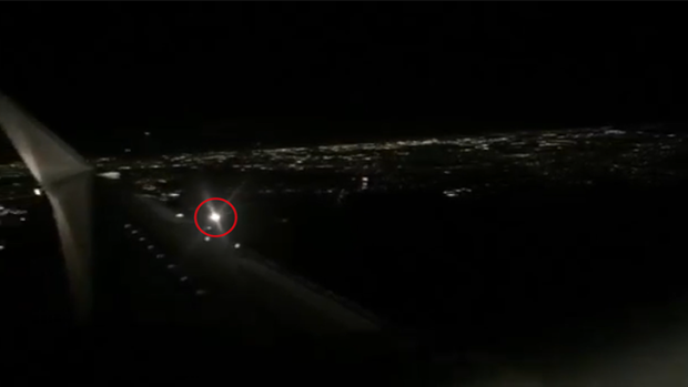 Video footage taken by a passenger shows the plane approaching.