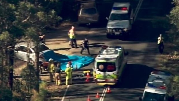 Motorcycle crash near Mt Mellun, near Beerwah, where motorcycle has collided with a parked police car.