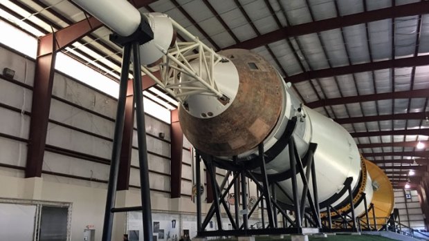 The giant Saturn V rocket which launched us to the Moon, complete with a rusted Command Module, on display at Johnson Space Center in Houston, Texas.