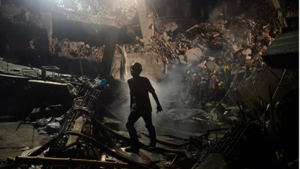 A rescue worker leaves the site where a garment factory building collapsed near Dhaka, Bangladesh April 29, 2013.