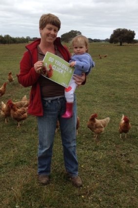 Free range egg producer Kathy Barrett from Katham Springs, pictured with her granddaughter, says the voices of smaller egg farmers are being drowned out by larger producers.