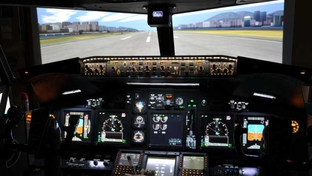 The cockpit of the 737 flight simulator.